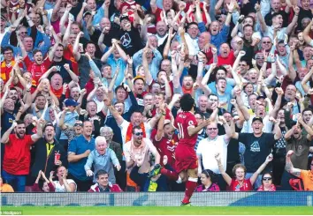  ??  ?? It was the Egyptian’s first home league goal and came in front of the Kop, after he demonstrat­ed great athleticis­m