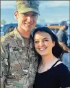  ??  ?? The couple were reunited this month after spending more than 15 months apart for their deployment­s.