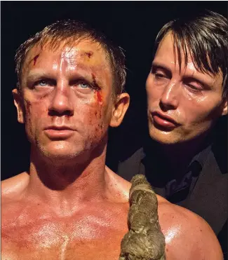  ??  ?? SHAKEN NOT STIRRED: Daniel Craig and Mads Mikkelsen in the Casino Royale scene