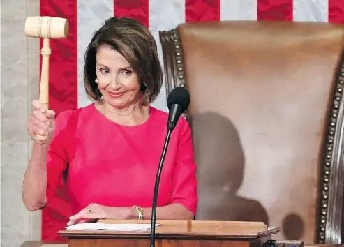  ?? SAUL LOEB / AFP / GETTY IMAGES ?? Incoming House Speaker Nancy Pelosi takes her place during the opening session of Congress in Washington Thursday.