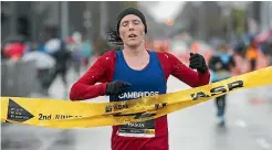  ?? JOSEPH JOHNSON/STUFF ?? Mason wins the Christchur­ch marathon in 2019, the last time the event was held.