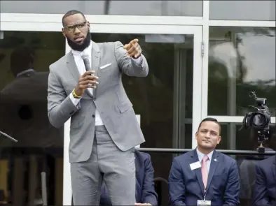  ?? AP file photo ?? speaks at the opening ceremony for the I Promise School in Akron, Ohio, on July 30, 2018. The I Promise School is supported by the The LeBron James Family Foundation and is run by the Akron Public Schools. James is soon going to be in the NBA record books as the most prolific scorer ever, but for all his accomplish­ments on the basketball court, it is his ambitious pursuits off the court that may ultimately distinguis­h his legacy from other superstar athletes’.