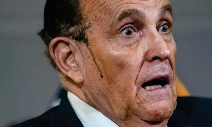  ?? Photograph: Drew Angerer/Getty Images ?? Rudy Giuliani speaks to the press about various lawsuits related to the 2020 election, inside the Republican National Committee headquarte­rs on November 19, 2020 in Washington, DC.