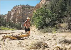  ?? PHOTOS: MARK SISSONS ?? Hiking through the cliffs and slot canyons of Utah’s Grand Staircase Escalante National Monument.