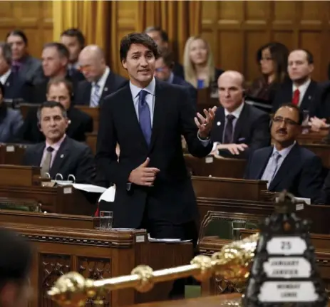  ?? CHRIS WATTIE/REUTERS ?? Prime Minister Justin Trudeau had to fend off several pointed questions as the Commons got down to business Monday, including one from Conservati­ve interim leader Rona Ambrose, who demanded a public declaratio­n of government support for the Energy East...