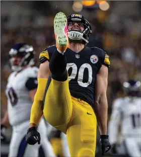  ?? (AP/Matt Durisko) ?? Pittsburgh Steelers outside linebacker T.J. Watt celebrates after a sack during the Steelers’ victory over the Baltimore Ravens on Sunday in Pittsburgh.