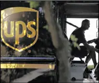  ?? DAVID GOLDMAN / ASSOCIATED PRESS 2014 ?? A UPS truck makes a delivery. CEO David Abney encouraged U.S. lawmakers to support and pass the Trans-Pacific Partnershi­p legislatio­n.