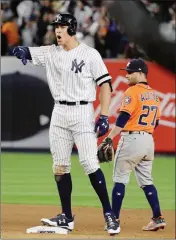  ?? ASSOCIATED PRESS ?? NEW YORK YANKEES’ AARON JUDGE reacts after hitting an RBI double during the eighth inning of Game 4 of the American League Championsh­ip Series against the Houston Astros on Tuesday in New York.