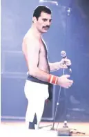  ?? COUTAUSSE / AFP/GETTY IMAGES JEAN-CLAUDE ?? Freddie Mercury, lead singer of Queen, performs in Paris in 1984.
