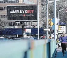  ?? JUSTIN TANG
THE CANADIAN PRESS ?? A billboard calling for Ottawa Senators owner Eugene Melnyk to sell the team is seen in Ottawa.