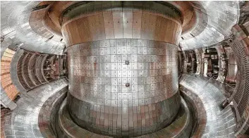  ?? Chinese Academy of Sciences ?? In the face of climate change, nuclear power is looking pretty good. A groundbrea­king fusion reactor, above, built by Chinese scientists, is underscori­ng Beijing's determinat­ion to be at the core of clean energy technology.