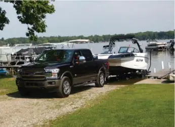  ?? JIM KENZIE ?? The backup assistance system helps when trying to back a trailer up, as in dropping a boat off at the ramp.