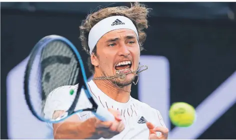  ?? FOTO: HAMISH BLAIR/AP ?? Alexander Zverev zeigte gegen Radu Albot nicht sein bestes Tennis, kämpfte sich aber am Ende doch souverän ins Achtelfina­le.