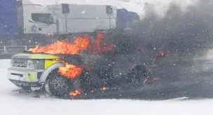  ??  ?? ●●A Highways England car caught fire, adding to the disruption