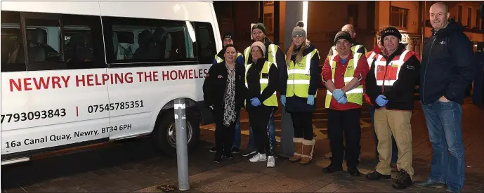  ??  ?? Mayor of Drogheda Pio Smith with members of the Newry Help The Homeless Group.