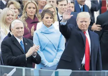  ?? Patrick Semansky Associated Press ?? FUNNY MEMES about First Lady Melania Trump’s dropped smile at the inaugurati­on were a form of fake news.