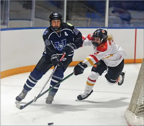  ?? STEVEN MAH/SOUTHWEST BOOSTER ?? Third-year Wildcats defenseman Kamryn Johnson (left) has signed to play with the Bishop’s University Gaiters.