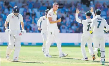  ?? AFP ?? ■ Jonny Bairstow (left) walks back after being dismissed by Josh Hazlewood (centre) on the second day of the third Ashes Test on Friday.
