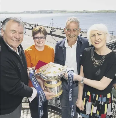  ??  ?? 2 Left to right: Les Ward of the Gillian’s Saltire Appeal; Pauline Thomson, a Gillian’s Saltire Appeal flat user; Sam Torrance and Valerie Ross, Maggie’s head of fundraisin­g (Scotland). Below left: Henrik Stenson, third right, Lee Westwood , right, and...