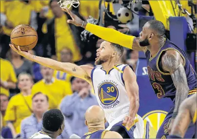  ?? AP PHOTO ?? In this June 1, 2017, photo, Golden State Warriors guard Stephen Curry (30) shoots against Cleveland Cavaliers forward LeBron James during the second half of Game 1 of NBA Finals in Oakland, Calif. Game 1 of the 2018 NBA Finals between the Warriors and...