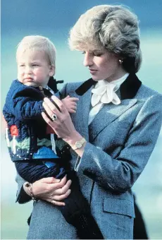  ?? ANWAR HUSSEIN/ WENN.COM/ FILES ?? Diana, then Princess of Wales, holds Prince William after arriving at Aberdeen airport in Dyce Aberdeen, Scotland in 1983. Diana was vocal about giving her children a ‘normal’ life.