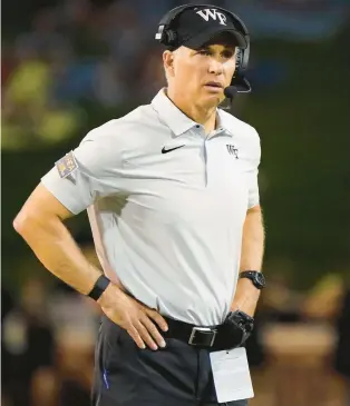  ?? CHUCK BURTON/AP ?? Wake Forest head coach Dave Clawson said that other schools tried to persuade six to eight of his players to transfer with promises of big endorsemen­t deals.