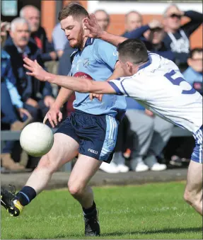  ??  ?? Niall Sharkey, Glyde Rangers sends this ball past Lannleire’s Jason Torris. Pic ture: Ken Finegan