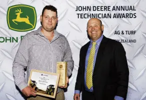  ?? PHOTOS: SUPPLIED ?? Southland Farm Machinery apprentice Logan Robertson (left), of the Invercargi­ll branch, won the Service Apprentice Technician of the Year award. He is with John Deere Australia and New Zealand managing director Luke Chandler.