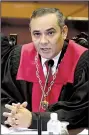  ?? AP/ARIANA CUBILLOS ?? Maikel Moreno, chief judge of Venezuela’s Supreme Court, said Saturday that the court had reversed a decision to strip lawmakers’ immunity from prosecutio­n as well as parts of a ruling removing some of their powers.