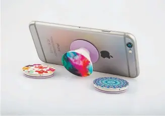  ?? Provided by Popsockets ?? Born from a Kickstarte­r campaign in 2012, Popsockets fixed the problem of how to hold one’s smartphone and scroll with the same hand.