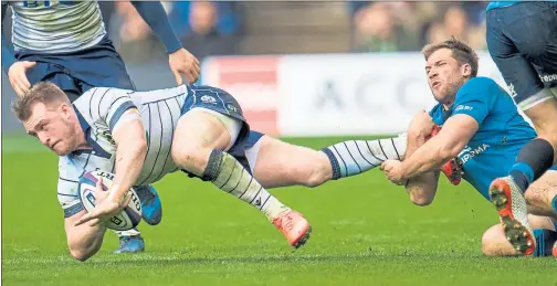  ??  ?? ON FORM: Hogg drives forward against the Italians, his consistent play making him a real contender for Gatland’s squad.