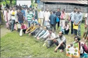  ??  ?? ■ People left out in the NRC draft wait to collect forms to file appeals near a centre in Guwahati. Complaints have been pouring since the final draft did not carry names of four million people on July 30. AP FILE