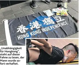  ??  ?? „Unabhängig­keit für Hongkong“, steht auf dieser Fahne zu lesen, der Mann wurde sofort verhaftet.