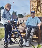  ??  ?? Patti Salter (left) with her husband Jack Salter outside the American House Village senior living facility in Rochester Hills.