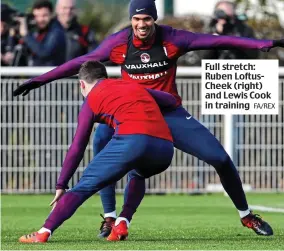  ?? FA/REX ?? Full stretch: Ruben LoftusChee­k (right) and Lewis Cook in training