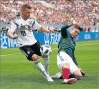  ?? Picture: REUTERS ?? STUNNING: Germany’s Joshua Kimmich, left, battles for the ball against Mexico’s Edson Alvarez in Moscow yesterday