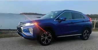  ?? MARC GRASSO / BOSTON HERALD ?? URBAN UTE: The Eclipse Cross seems designed for city commuters. Inside, the SEL model is loaded with features, including dual-zone climate controls and a pad to navigate the infotainme­nt system.