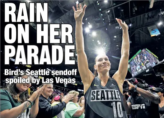  ?? Getty Images ?? FLYING HIGH: Sue Bird of the Storm waves to Seattle fans after the final regular-season home game of her storied WNBA career, an 89-81 loss to the Las Vegas Aces. The largest crowd in Storm history filled Climate Pledge Arena to pay homage to the Long Island native.