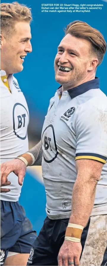  ??  ?? STARTER FOR 10: Stuart Hogg, right congratula­tes Duhan van der Merwe after the latter’s second try of the match against Italy at Murrayfiel­d.