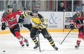  ??  ?? Tigers’ Grant Reekie leads the charge against Kilmarnock Thunder.