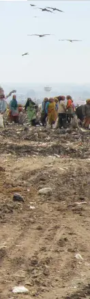  ??  ?? 12-year-old Bittoo (right) bleeds and often catches infection as he rummages through piles of garbage at the Bhalswa landfill with bare hands