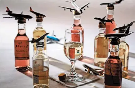  ?? ABEL URIBE/CHICAGO TRIBUNE; MARK GRAHAM/STYLING ?? Finding the right wines for dehydrated and diminished palates at 36,000 feet is a difficult endeavor.