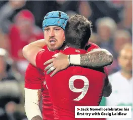  ??  ?? > Jack Nowell celebrates his first try with Greig Laidlaw