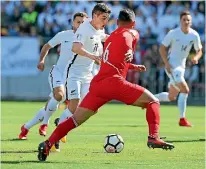  ?? PHOTOSPORT ?? All Whites attacker Marco Rojas carries on Saturday. the ball through midfield in Wellington