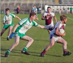  ??  ?? Coolboy’s Jonathan Smyth evades capture against Baltinglas­s.