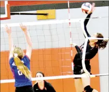  ?? RICK PECK/MCDONALD COUNTY PRESS ?? McDonald County’s Karla Barreda attempts a spike in the Lady Mustangs’ loss to East Newton on Saturday at MCHS.