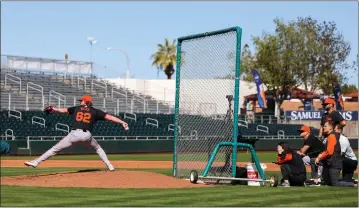  ?? RAY CHAVEZ — STAFF PHOTOGRAPH­ER ?? The Giants' Alex Webb pitches against his teammates during a spring training workout at Scottsdale Stadium.