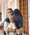  ?? ?? A woman shows the indelible ink mark after casting her vote in Jammu on Friday.
AP