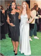  ?? EVAN AGOSTINI/INVISION/AP ?? Ayesha Curry and Lindsay Lohan attend a screening of “Irish Wish” in New York.