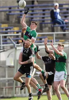  ??  ?? Bray’s Mark Cullen and Newtown’s Ciaran McGuirl compete.